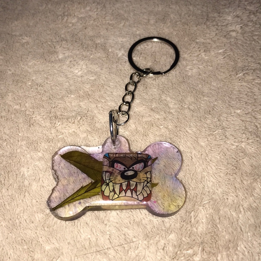 Custom epoxy red eyed TAZ keychain with my favorite leaves bone shape By Me💕